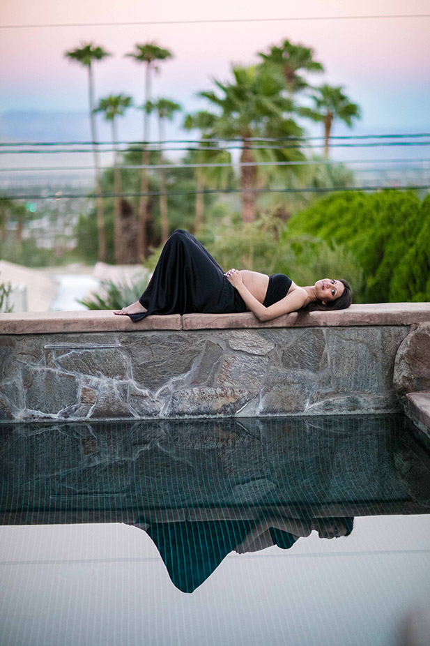 Natasha Palmsprings Maternity photo near a pool